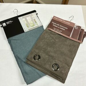 Set of two drapery panels. New and never been used.